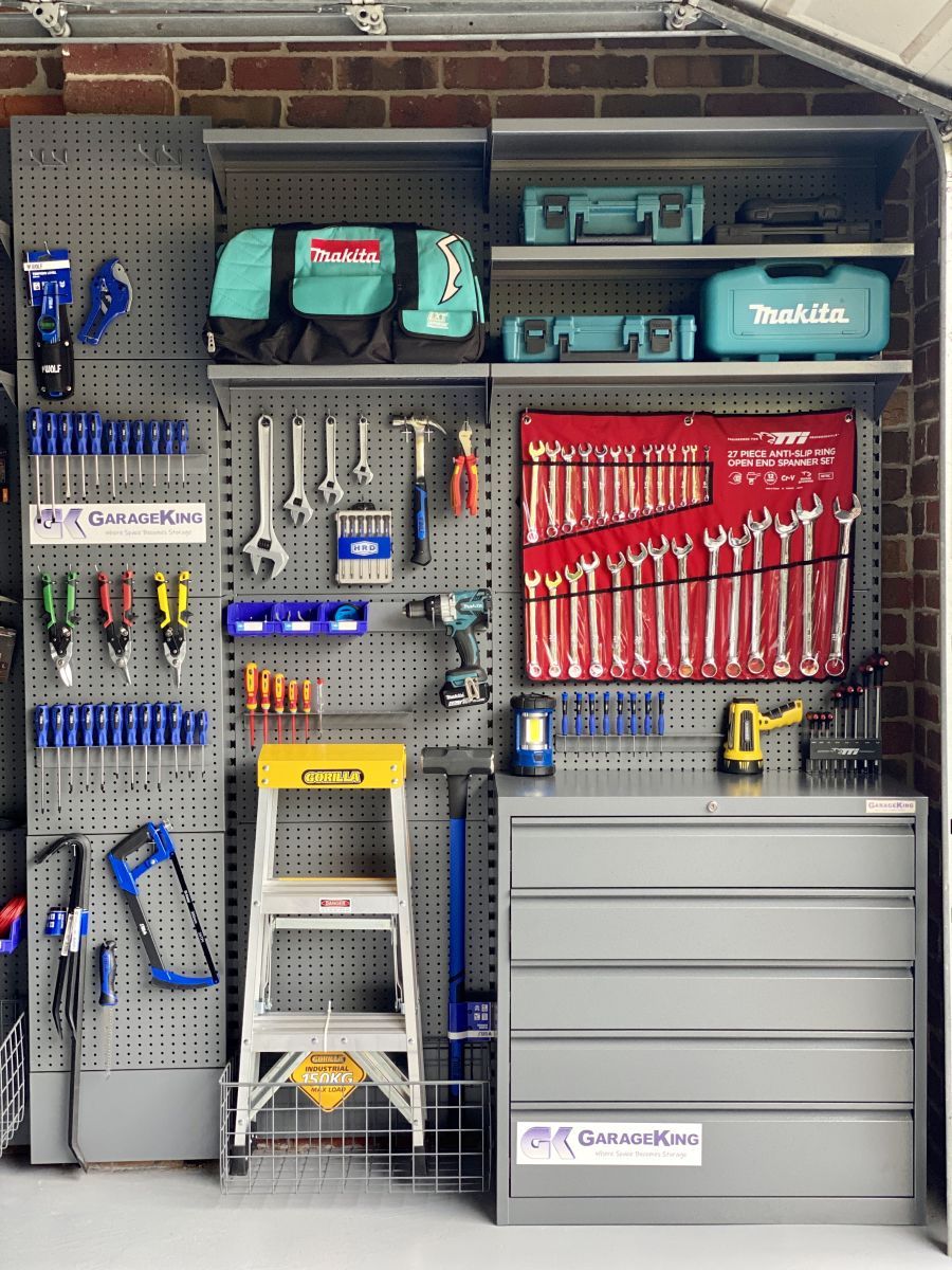 A grey powder coated garage storage system custom designed for tools in a home garage