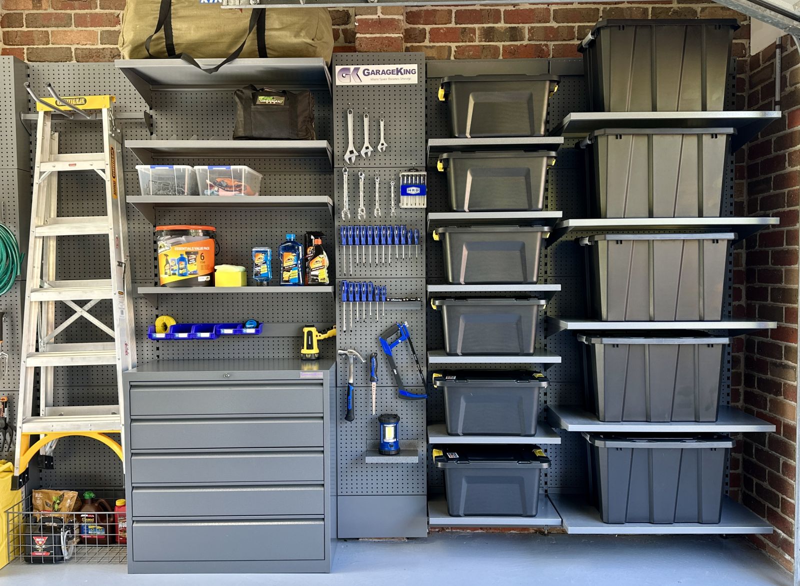 Built-in garage storage system with storage shelves, drawers and hooks