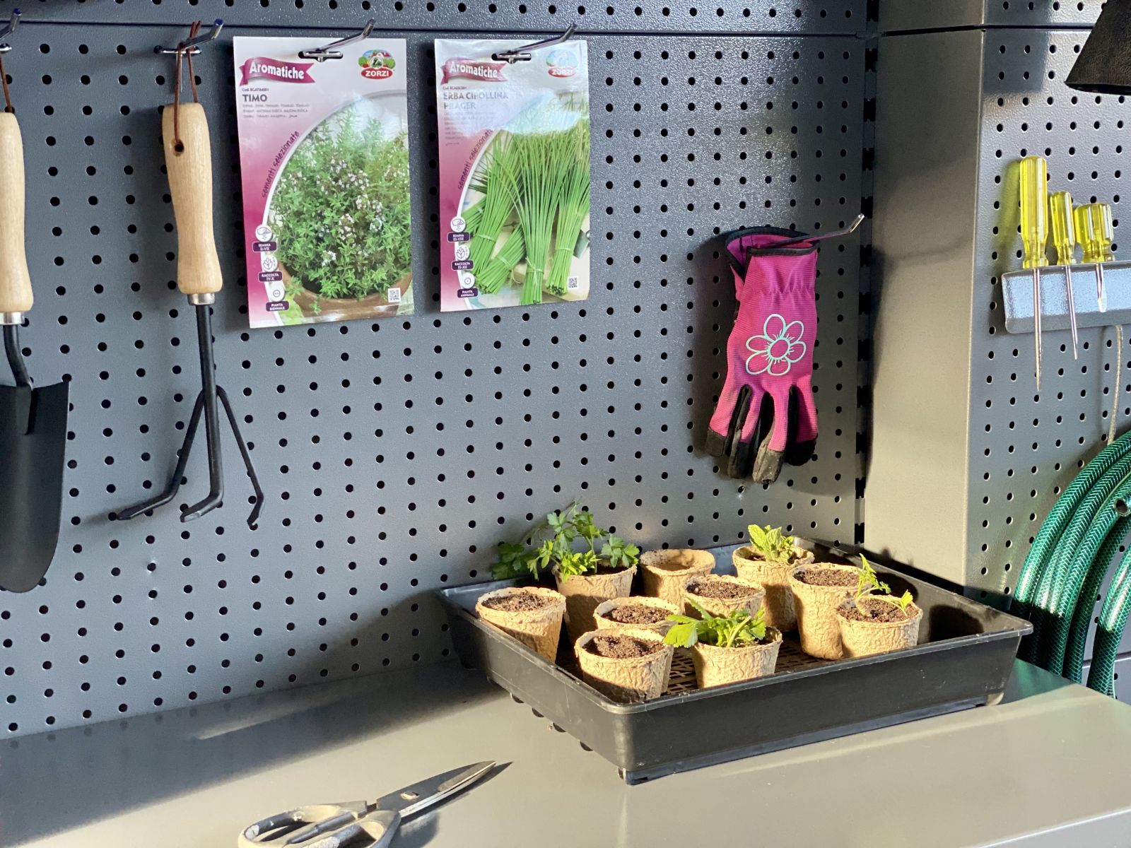 Garden tools in a potting station