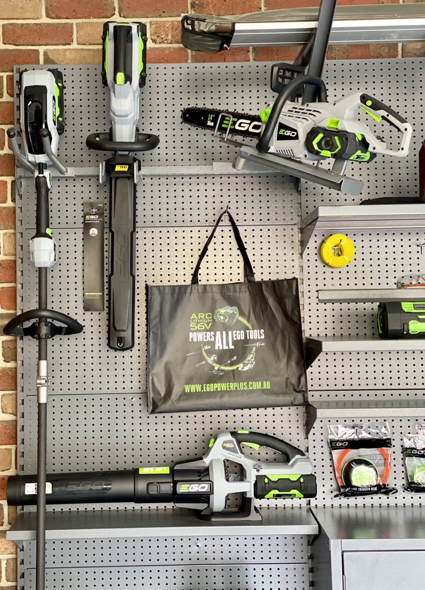 Garden tools in a garage storage system